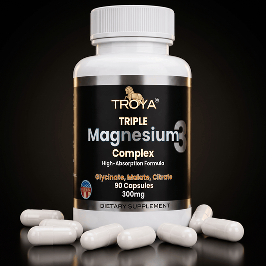 Troya Triple Magnesium Complex supplement — bottle on a dark studio background